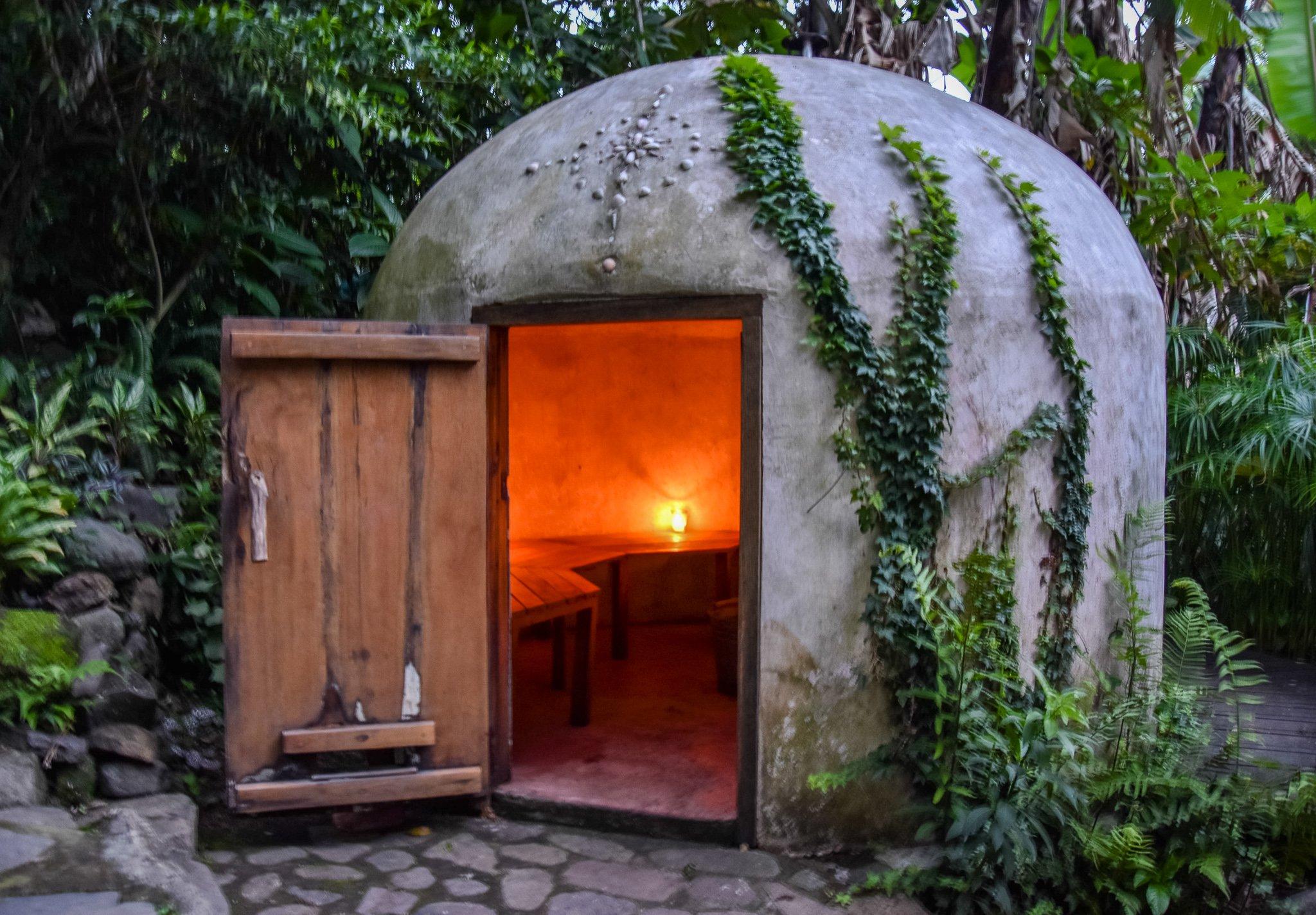Traditional temazcal sauna glowing at night